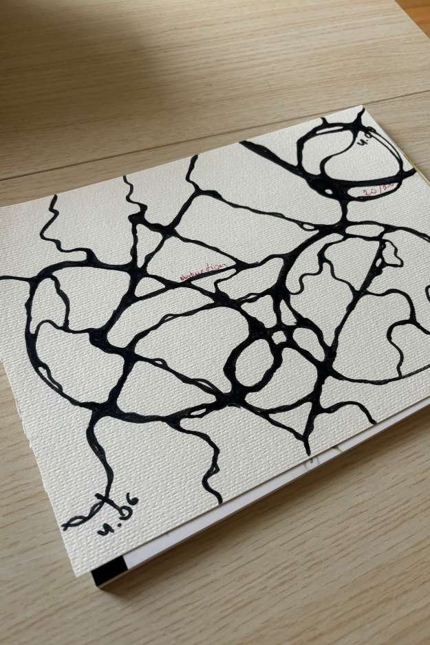 Abstract neurographic drawing with fluid lines and bold colors blending into a dynamic visual pattern.