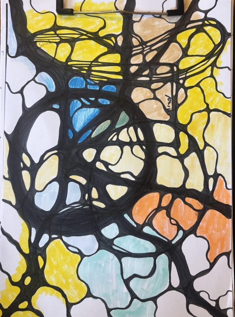 A bright and open Neurographica piece with expansive black lines forming large shapes, colored in yellow, orange, light blue, and beige tones. Words like "soul" appear within the forms, hinting at deeper reflection. The page is held in place by a metal clipboard clip.