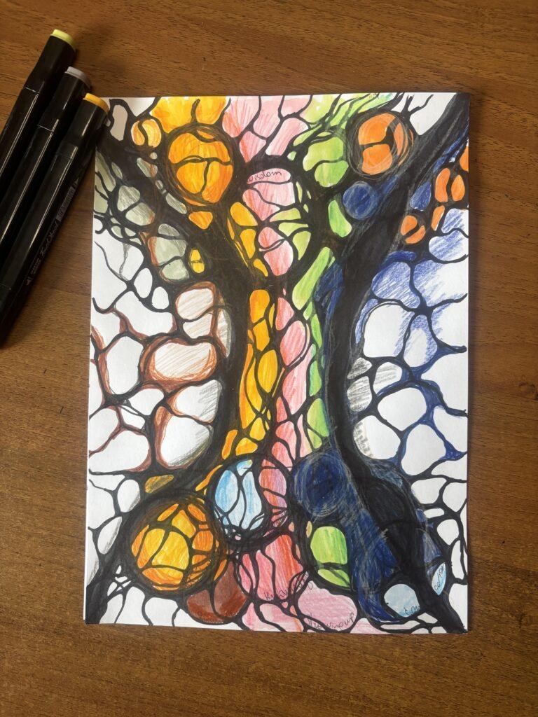A Neurographica Tree drawing with a central hourglass-like structure, rich in vibrant tones like yellow, orange, pink, blue, and green. Surrounded by fine black branches, this artwork evokes movement, growth, and inner balance. Drawing pens rest beside the page.