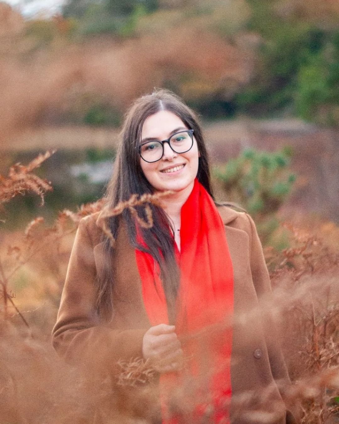 Ana Jomir in an autumn field